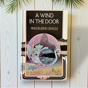 A Wind in the Door by Madeleine L’Engle
Vintage Paperback | Sci-Fi Fantasy
